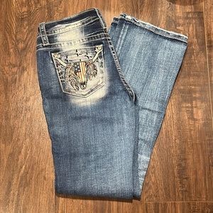 Miss me Jeans in size 27 (with 32in inseam). Mid-rise and bootcut